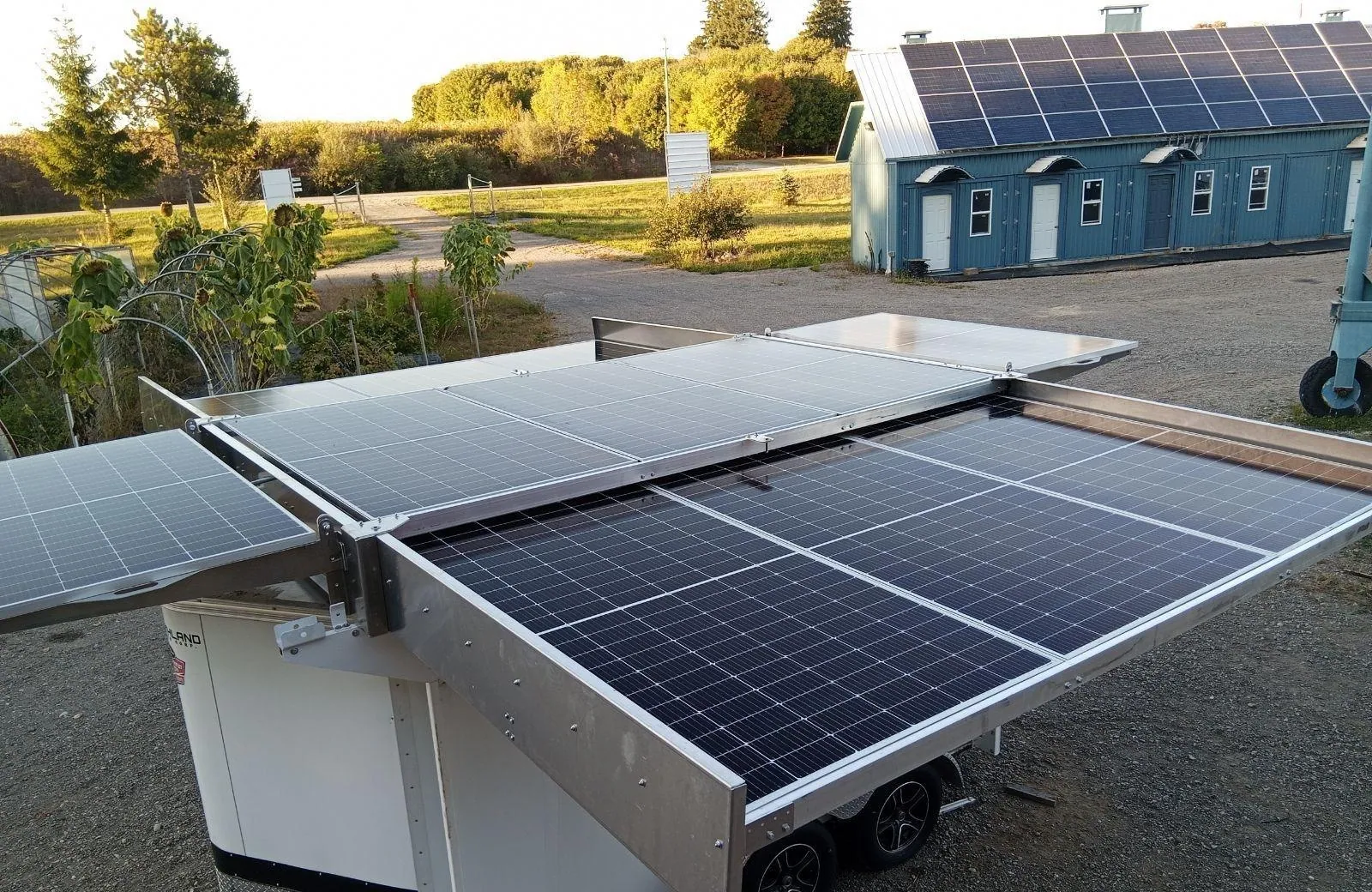 Insula foldable solar array trailer deployed on site